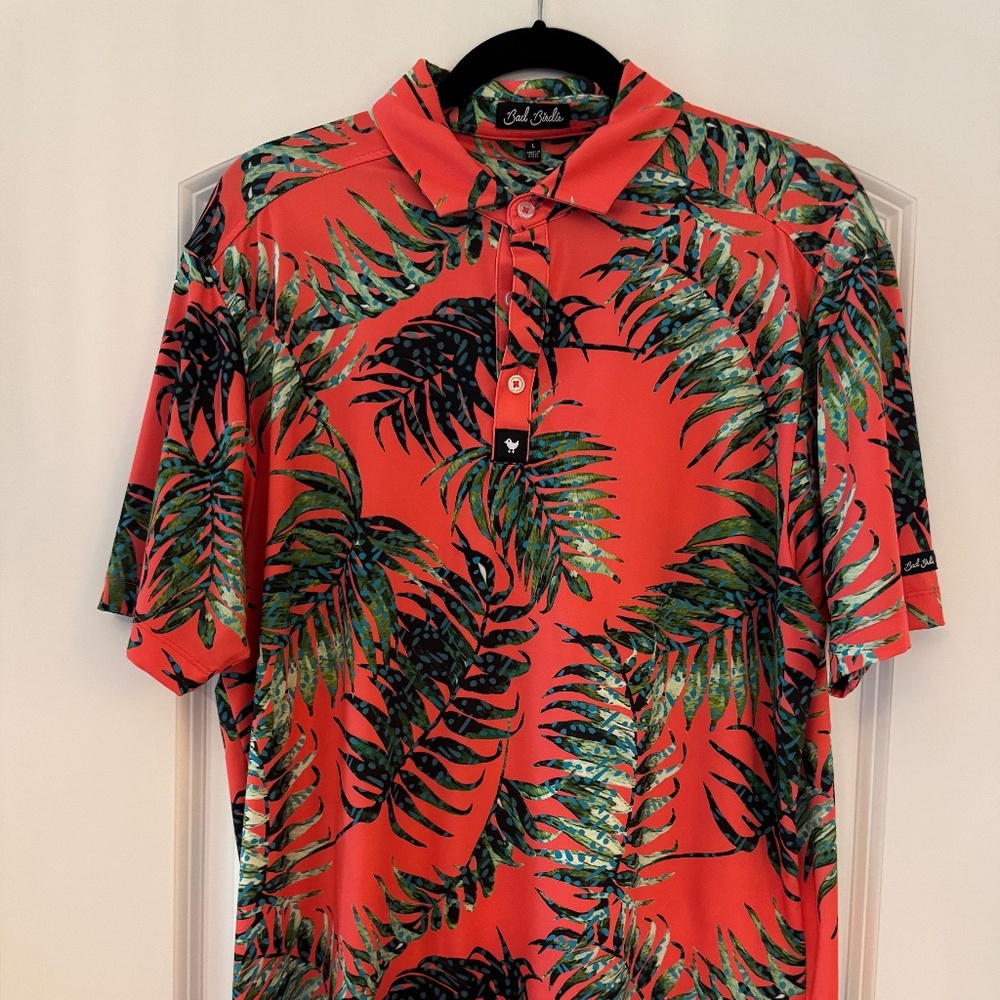 Bad Birdie Men's Coral Polo with Green Tropical Leaf Print